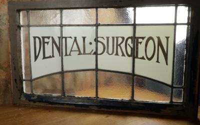 Dental Surgeon Glass Sign